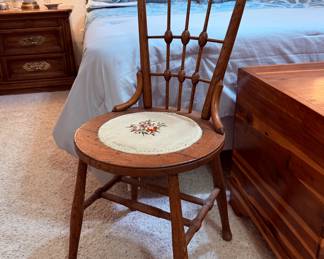 Vintage wood chair with hand-stitched cushion