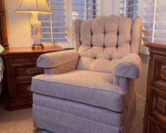 Cushioned armchair