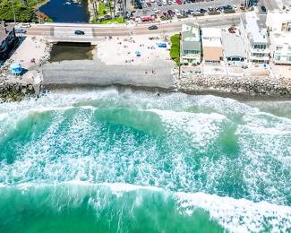 Ocean you can walk to. Beach home in southern California right near the beach. Walk to beach, coffee shops, restaurants and shopping. Have coffee or dine on the beautiful rooftop. Less than $395,000.  Call Joe for info: 480-577-8396