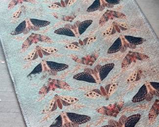 Colorful moth mat