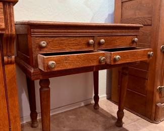 Antique wooden desk with drawers