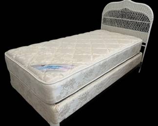 Twin Bed with White Wicker Headboard 