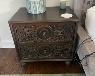 A Pair of nightstands and lamps