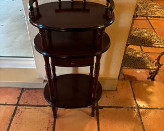 Three tier table with drawer