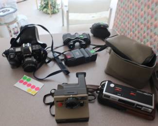 vintage poloroid, minolta, binoculars and other cameras