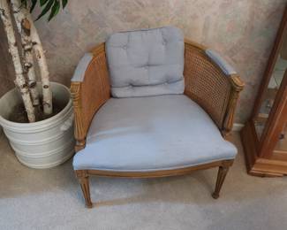 one  of  two  cane  chairs