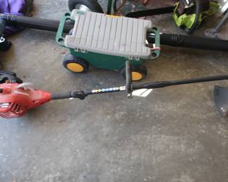 Homelite  weed cutter,  green  cart
