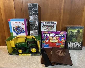 John Deere 8430 Die-Cast Tractor, Baseball Cards, Models, and more new in box toys.
