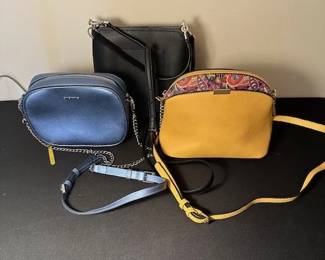 Blue Cross Body handbag, Kate Spade black handbag and gold cross-body handbag.