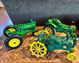 John Deere Collectibles.  Heavy and exact replicas.