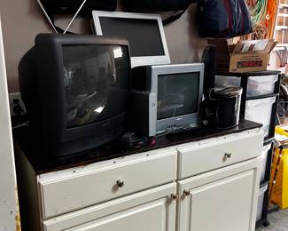 T V ‘s and Cabinet