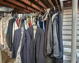 basement. these clothes have been stored properly. most plastic from dry cleaners have been removed from items.....XL...men