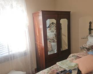 upper level, end of hallway, left bedroom.