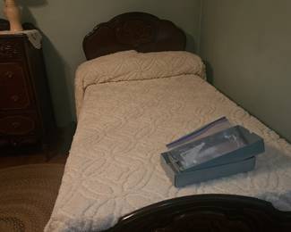 1 of 2 twin beds. upstairs bedroom end of hallway