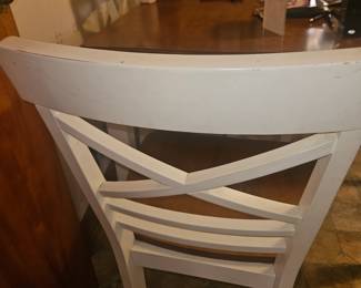 detail of 4 chairs, set with table. Heavy bring help.