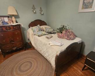 upper level, end of hallway, right bedroom, sorry , no rug