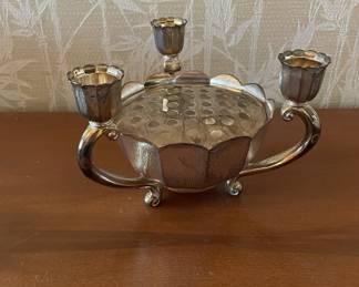 Silver-tone Italian metal flower frog with three integrated candle holders. Marked "Italy" on base.