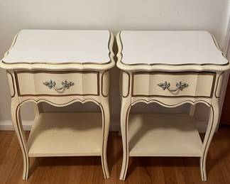 Matching nightstands in cream and gold finish with single drawer and open shelf base. Curved cabriole-style legs. Light surface wear. Approx. 15"x 18" x 25"