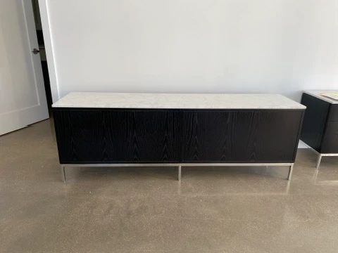 We have 2 of these to sell! "Florence Knoll Credenza" - 4
Position. DWR List Price $15,827.00
Top: Satin Marble - color Carrara. Body: Ebonized Oak
Base: Polished Chrome . Manufactured by Knoll.