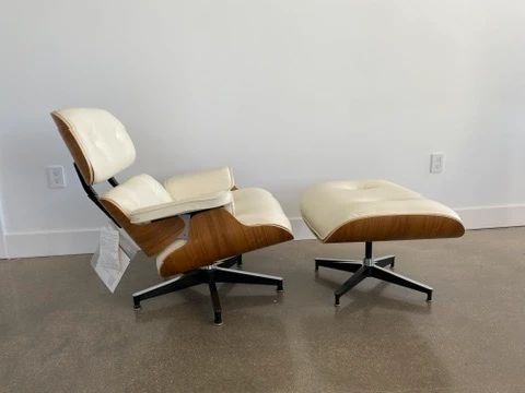 Eames Leather Lounge Chair and Ottoman Designers: Charles and Ray Eames
Materials: Walnut wood and ivory leather List Price on DWR website: $11,595.00. 