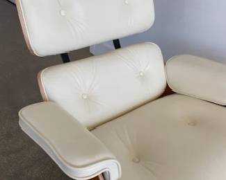Tags still on! "Eames Leather Lounge Chair and Ottoman" Designers: Charles and Ray Eames. DWR  List Price: $11,710.00. 
Materials: Walnut wood with Ivory leather. 