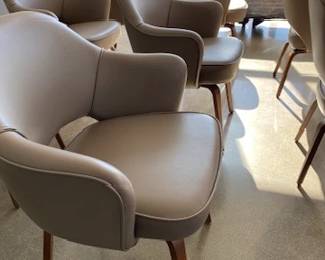 Saarienen Executive Armchair x 6. Designed by Ero Saarinen. A total of 6 chairs avaiable. Walnut wood legs and taupe leather upholstery. DWR retail price: $3,295.00 each.