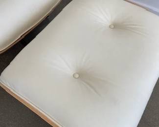 Tags still on! "Eames Leather Lounge Chair and Ottoman" Designers: Charles and Ray Eames. DWR  List Price: $11,710.00. 
Materials: Walnut wood with Ivory leather. 