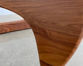 Noguchi Coffee Table designed by Isamu Noguchi. Glass and walnut. DWR retail price $2,295.00. 