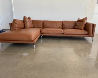 Como Leather Sectional - LAF - designed by Giorgio Soressi for Design Within Reach. DWR retail price $15,569.00. Material: Raise Leather, Color: Canyon Left Facing Chaise

Height (in): 27¼
Width (in): 128½
Depth (in): 79½
Weight (lbs): 330
Seat Height (in): 16½
Seat Depth (in): 28⅜
Back Height (in): 26
Arm Height (in): 26½
Arm Length (in): 52
Arm Width (in): 3
Leg Height (in): 6⅛