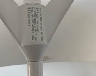 Spun Floor Lamp designed by Sebastian Wrong. High-gloss paint, 69" H. DWR retail price: $3,045. Sculptor and designer Sebastian Wrong demonstrates his flair for bold, minimalist forms in his Spun Lamp (2001) for Flos. This lamp features satin-smooth, high-gloss machined aluminum for maximum dramatic impact. The fluid pedestal base stabilizes the design, and the full-range on-cord dimmer provides infinitely variable light. Bulb (not included): incandescent 240W/A21/E26 or comparable CFL/LED. Made in Italy.