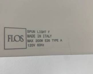 Spun Floor Lamp designed by Sebastian Wrong. High-gloss paint, 69" H. DWR retail price: $3,045. Sculptor and designer Sebastian Wrong demonstrates his flair for bold, minimalist forms in his Spun Lamp (2001) for Flos. This lamp features satin-smooth, high-gloss machined aluminum for maximum dramatic impact. The fluid pedestal base stabilizes the design, and the full-range on-cord dimmer provides infinitely variable light. Bulb (not included): incandescent 240W/A21/E26 or comparable CFL/LED. Made in Italy.
