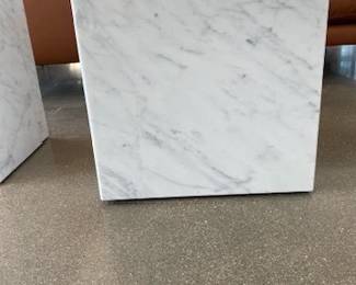 Plinth Side Tables designed by Norm Architects. Material: White carrara marble - We have 1 that is short and 1 that is tall.  2 to sell total. Both list at retail for $1,625.00. 