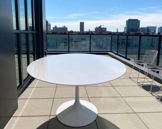 Saarinen Outdoor Dining Table designed by Eero Saarienen. Manufactured by Knoll Studio. DWR retail price: $8,576.00
Color: White