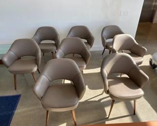 Saarienen Executive Armchair x 6. Designed by Ero Saarinen. A total of 6 chairs avaiable. Walnut wood legs and taupe leather upholstery. DWR retail price: $3,295.00 each.