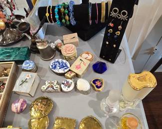 collectible boxes, costume jewelry, and vintage perfume bottles