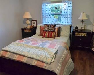 Full sized bed, headboard, footboard, mattress, box spring and metal frame.  Nightstands, lamps and more