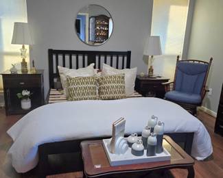 close up of bed and antique coffee table