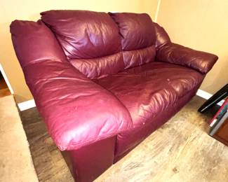 Leather sofa.  37" H x 68" W x 33" D.