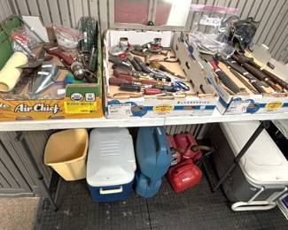 Variety of hand tools, coolers, plastic gas cans.