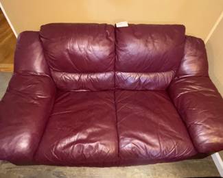 Leather sofa.  37" H x 68" W x 33" D.