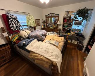 Bedroom is loaded with clean, useful items.