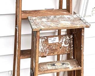 Wood 6 ft and 4 ft ladders.