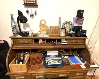 Roll top desk. Royal typewriter. Office items.