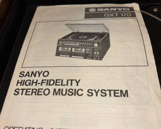
Sanyo High-Fidelity Stereo Music System w/cabinet.
