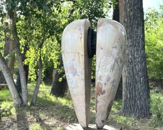 "Union" by Kellogg Johnson Raku Clay & Bronze this epic piece is being offered for $6,000 & was once $30,000 the lucky collector must hire professional art movers to move this piece from the property