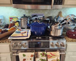 Great selection of Revere wear pots and pans, very nice blue cast iron Dutch oven ,dough bowl