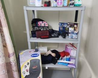 Beauty and bathroom products Dr Scholl's back massager Ace bandages page bag of placards makeup bags blood pressure monitors