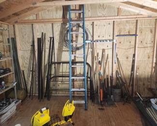 Antique iron bed lots of good garden tools outdoor lights extension ladder