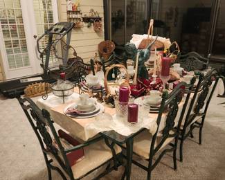 Gorgeous wrought iron /glasss Table / six chairs Two arms & four side chairs.
Perfect for any dining room or porch
Very nice high quality