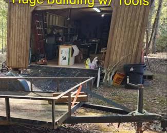 Huge barn with tools and trailer
